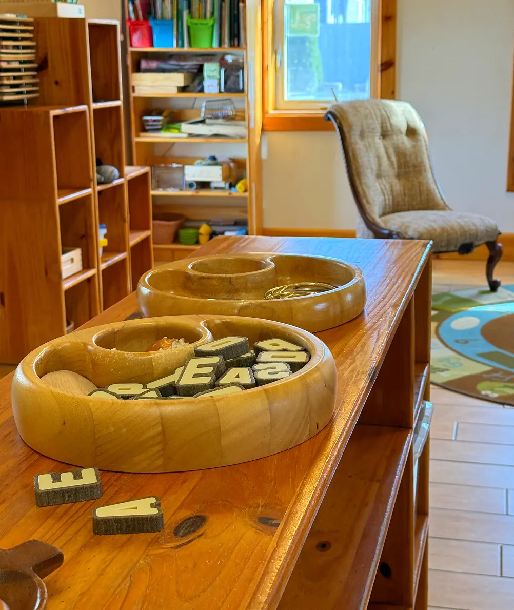 Learning Together Childcare classroom with natural wood interiors and multiple play-based learning areas