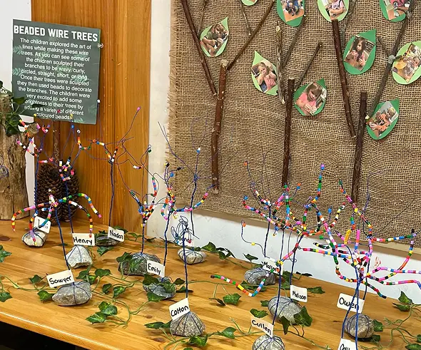 Children’s beaded wire tree artwork displayed at Learning Together Childcare